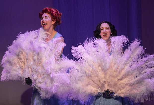 Ashley Brooke James, left, as Betty Haynes, and Alicia Frias, right, as Judy Haynes, are pictured in the Georgetown Palace dress rehearsal for "White Christmas" on Thursday, November 21, 2024.  The production is playing on the Springer Stage through December 29th.  Photo by Andy Sharp.