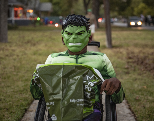 14-year-old Desmond Thomas was dressed as the Incredible Hulk during  Halloween night along Main Street  on Thursday, October 31, 2024.   Photo by Andy Sharp.