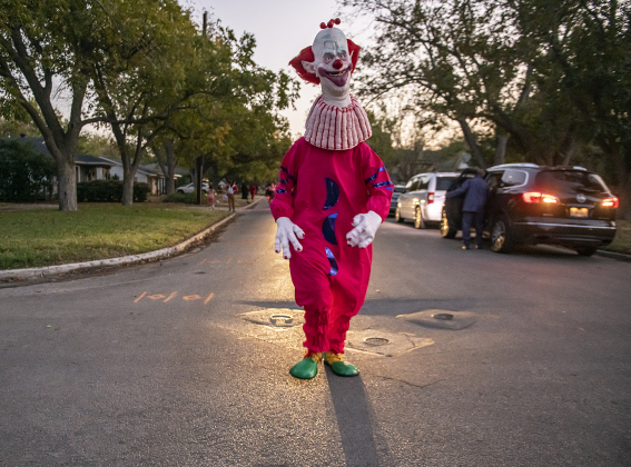 Eric Lowrance was dressed as the Slim Clown during  Halloween night along Main Street  on Thursday, October 31, 2024.   Photo by Andy Sharp. 