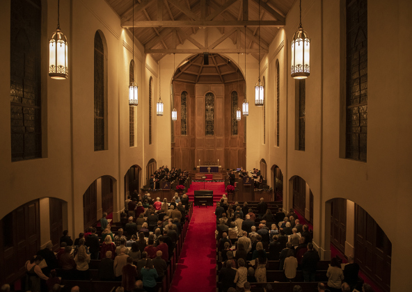 Attendees gather for a service in Lois Perkins Chapel, the site of two candlelight services at Southwestern University  on Thursday, December 5, 2024. The annual Service of Lessons and Carols began in 1915, then called the Christmas Carol Service.   Photo by Andy Sharp.