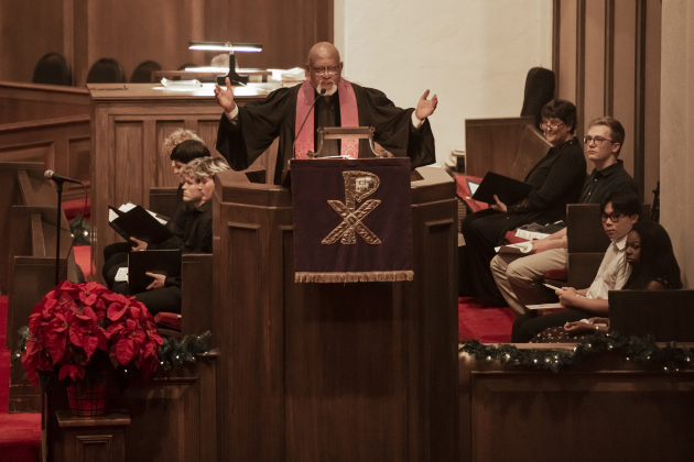 Rev. Dr. Ronald L. Swain, Southwestern University Chaplain and Director of Spiritual Life, conducts the first of two candlelight services in Lois Perkins Chapel on Thursday, December 5, 2024. The annual Service of Lessons and Carols began in 1915, then called the Christmas Carol Service.   Photo by Andy Sharp.