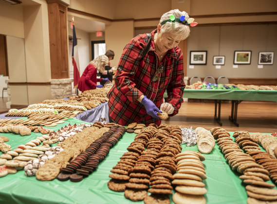 Sun City resident Margaret Hornsby was one of the volunteers helping prepare 500 dozen homemade cookies for the Women Helping Others.