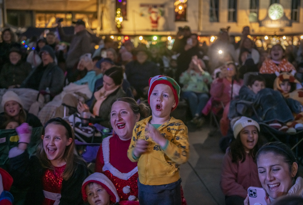 Laura Kincheloe and her son Cameron, 3, were enthralled at  the annual Lighting of the Square in downtown Georgetown on Friday, November 29, 2024. The streets and courthouse lawn were jammed with thousands of attendees on a cool autumn evening.    Photo by Andy Sharp.