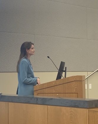 Assistant to the City Manager Jessica Clarke presents potential changes to the city’s grant program on November 26. (Photo by Kaitlyn Wilkes)