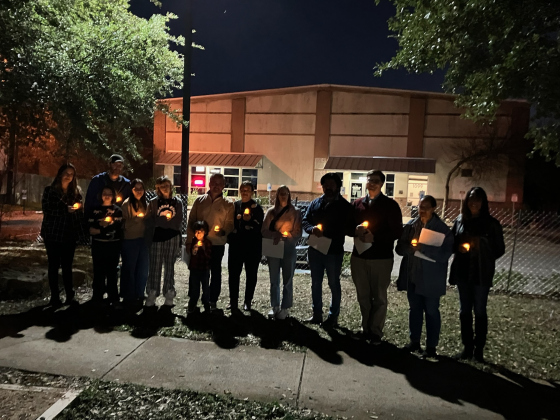 Members of the Wilco Homeless Coalition gathered outside the Volunteer Serving Center in Round Rock for the first annual vigil for the Williamson County Homeless Persons Memorial in late December. Photo courtesy of the Wilco Homeless Coalition.