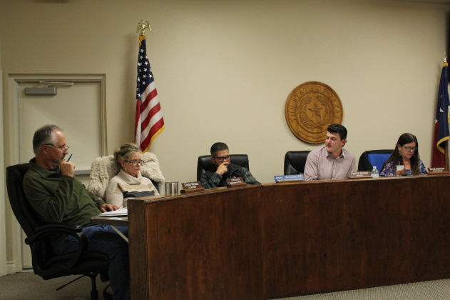 Jarrell City Council, from left to right Mayor Pro Tem Daniel Klepac, Alderwoman Place 2 Lori Allen, Interim City Manager Jorge Hernandez, Mayor Patrick Sherek and Alderwoman Place 3 Tanya Clawson discuss the first city council meeting of the year, January 7. Photo by Nalani Nuylan.