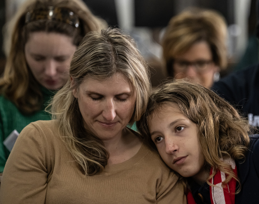 Cynthia Drake and her son August Leonard, 14, attend the Dr. Martin Luther King Jr. Day celebration.