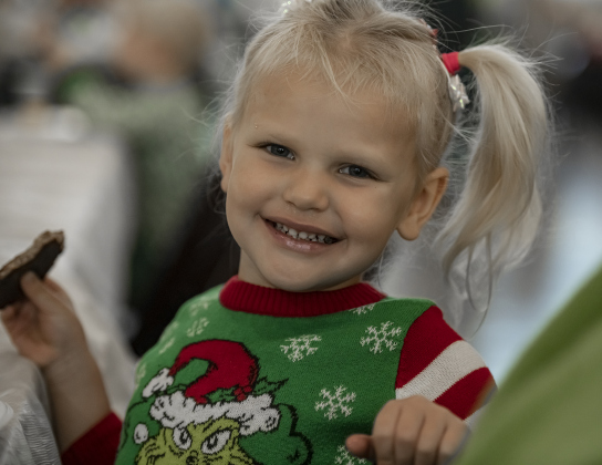 4-year-old Kinsley Hocker enjoyed her pancakes and sausage during  Breakfast With Santa, held Saturday, December 21, 2024 at the San Gabriel Community Center.  The event, coordinated by the Georgetown Fire Department and the Rotary Club of Sun City, served up pancakes, sausage, juice and coffee too attendees.  Santa Claus was there throughout the morning to visit the kids and their families.    Photo by Andy Sharp.