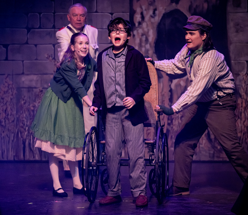 Molly Jackson, as Mary Lennox, William Reeves, center, as Colin Craven, and James Hamrick, playing Dickon, are pictured in a dress rehearsal photo from the Georgetown Palace production of “The Secret Garden” on  Thursday, January 30, 2025. The play runs on the Springer Stage through March 2.   Photo by Andy Sharp.