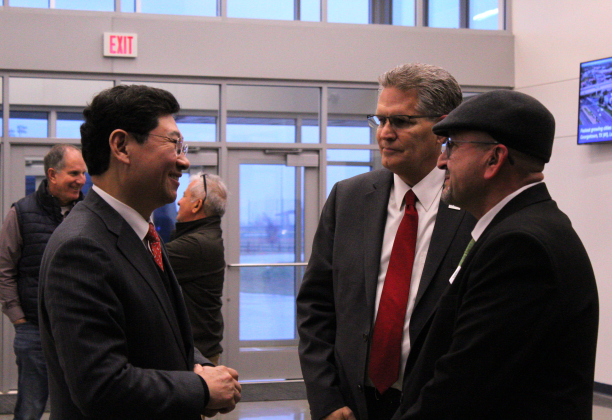Mayor of Yongin City Sang il Lee, left, gets introduced to Taylor Mayor Dwayne Ariola by County Judge Bill Gravell at the Taylor Expo Center, January 9.