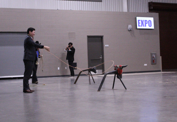 Mr. Lee tries to ring the steer, but the lasso undershot the bull’s head. The rodeo demonstrations were part of the celebration’s reception.