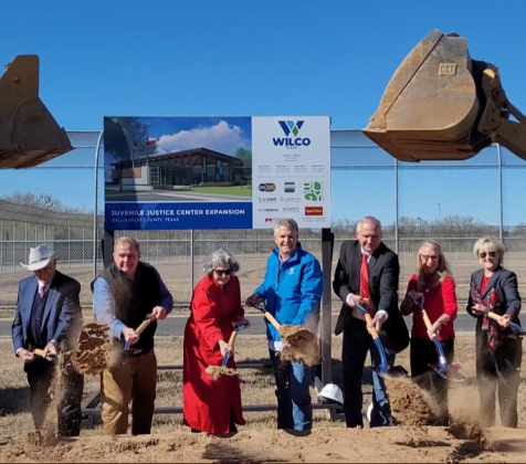 From left to right, Congressman John Carter, County Commissioner Russ Boles, County Commissioner Terry Cook, County Judge Bill Gravell, Juvenile Services Executive Director Scott Matthew, County Commissioner Cynthia Long and County Commissioner Valerie Covey break ground on the Juvenile Justice Center in Georgetown, Friday.
