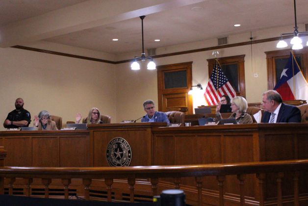 County Commissioners Terry Cook, Cynthia Long and Valerie Covey vetoed the proposed $140,000 salary during the February 4 Commissioners Court meeting. Photo by Nalani Nuylan.