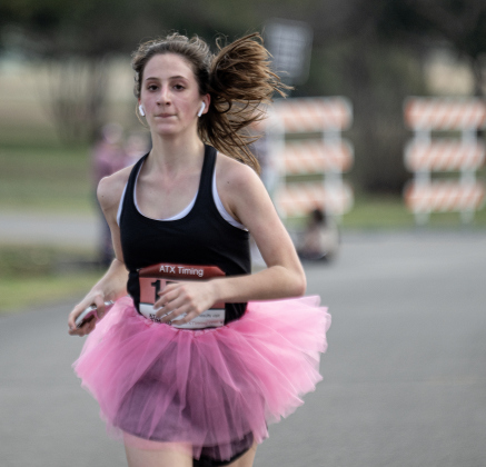 Ryah  Roberson nears the completion of her 5K run  during the 30th Annual Cupid’s Chase, held in San Gabriel Park on Saturday, February 8, 2025. The event is sponsored by the Georgetown Parks Department.   Photo by Andy Sharp.