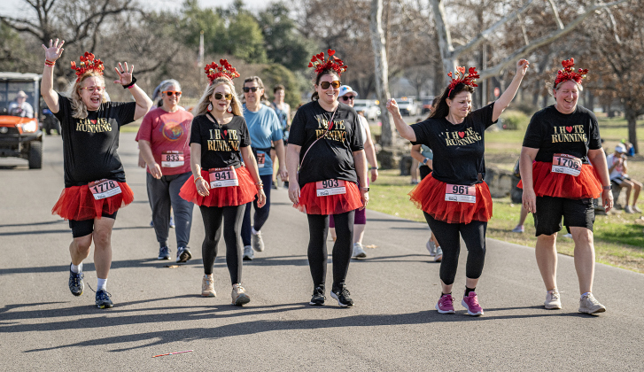 Friends (left to right) Stacy Suhre, Jennifer Levy, Stacy Kaase, Julie Sarangi and Casey Reichert, all wearing their “I hat running” t-shirts, finished their 5K event with a determined walk during the 30th Annual Cupid’s Chase, held in San Gabriel Park on Saturday, February 8, 2025. The event is sponsored by the Georgetown Parks Department.   Photo by Andy Sharp.