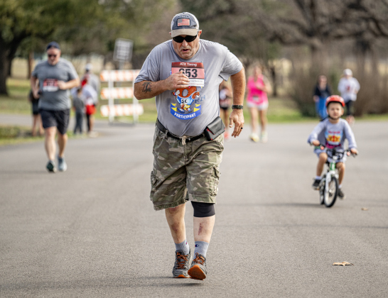 John Best completes his 5K run during the 30th Annual Cupid’s Chase, held in San Gabriel Park on Saturday, February 8, 2025. The event is sponsored by the Georgetown Parks Department.   Photo by Andy Sharp.