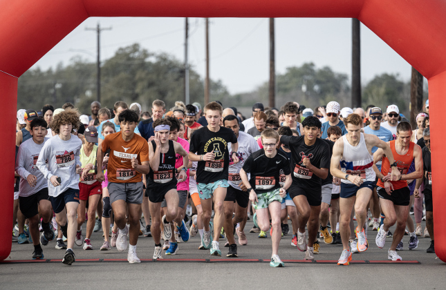 Runners leave the starting line for the 5K race during  the 30th Annual Cupid’s Chase, held in San Gabriel Park on Saturday, February 8, 2025. The event is sponsored by the Georgetown Parks Department.   Photo by Andy Sharp.