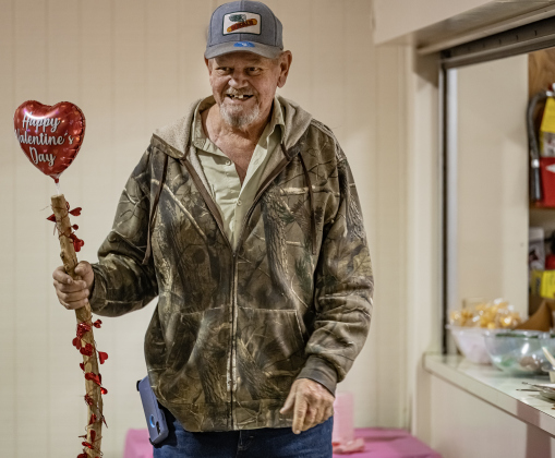 Diner Don Tschoerner brought a  Valentines-themed walking stick he made himself during the 9th Annual Free Soup Supper, held at St. Peter Lutheran Church  on Monday, February 10, 2025.