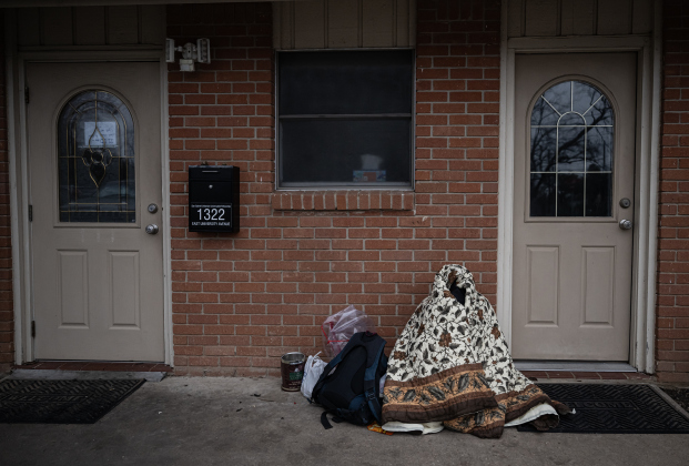 Jeffrey Jenkins is bundled up as he waits for the warming shelter  to open at San Gabriel Unitarian Universalist Fellowship on Wednesday evening, February 19, 2025.   The shelter will be open until 9 a.m. on Saturday. Photo by Andy Sharp