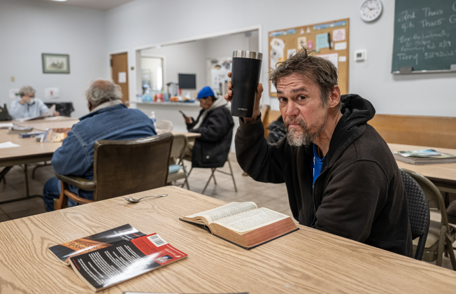 Michael Joseph Mann finds comfort in a warm place at St. James Episcopal Church on Wednesday, February 19, 2025.