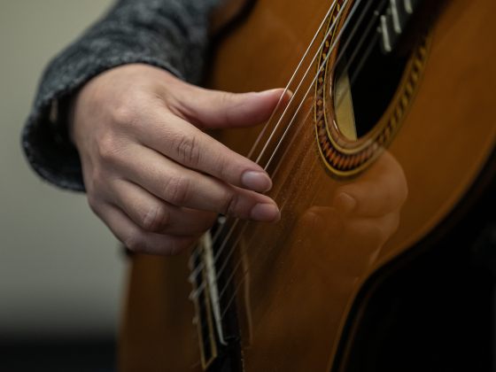 Gabriela Bravo (pictured) strums her guitar as she and Kevin Taylor  perform during a Williamson County Guitar Society meet and greet held at the Georgetown Public Library on Saturday, February 22, 2025.  Their 30-minute performance was for those interested in playing or listening to guitar music.  The Williamson County Guitar Society will offer a concert at 4p.m. on Sunday, March 9 at the Penfold Theatre Company in Round Rock.   For those interested, the group’s website is wilcoguitar.org.