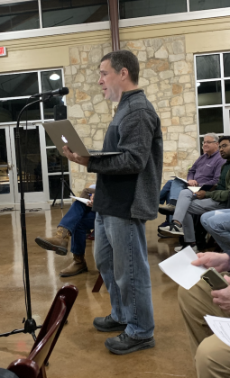 Georgetown resident Heath Cole voices concerns during a February 11 Texas Commission for Environmental Quality meeting about a Nova368, LLC wastewater package plant permit. (Photo by Kaitlyn Wilkes)