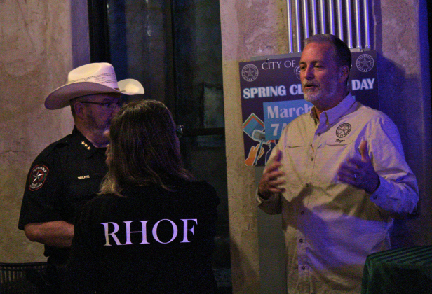 Mayor Ben Daniel, right, answers a question from a member of RHOF after the meeting. Photo by Nalani Nuylan.