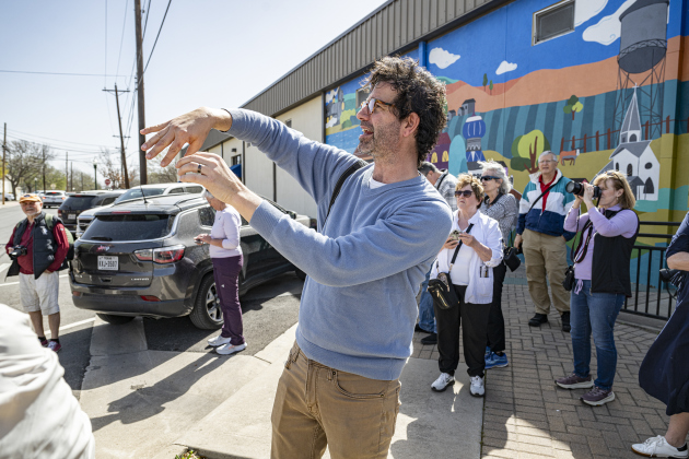 Architecture photographer Nikola Olic, shown here at 9th Street and Austin Avenue, led a photo walk around downtown Georgetown during the Texas Photography Festival.