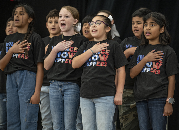 The Showstoppers, the Honors Choir at Village Elementary School, perform during the Georgetown I.S.D. State of the District event, held at district headquarters on Thursday, March 13, 2025.   Photo by Andy Sharp.