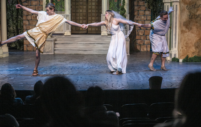 Dawson MacLeod, left, as Hero, Teddi Iley, center, as Philia, and Nathan Clemenson, right, as Prologus, are pictured in a Thursday, March 20, 2025 dress rehearsal of “A Funny Thing Happened On the Way to the Forum,” playing on the Palace main stage through April 19th.    Photo by Andy Sharp.