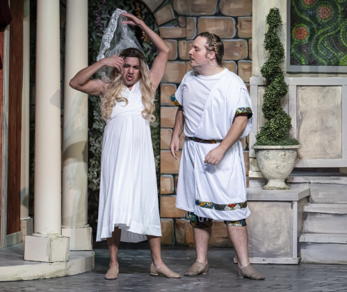 AJ Reyes, left, as Hysterium, and Nathan Clemenson, right, playing Prologus,  are pictured in a Thursday, March 20, 2025 dress rehearsal of “A Funny Thing Happened On the Way to the Forum,” playing on the Palace main stage through April 19th.    Photo by Andy Sharp.