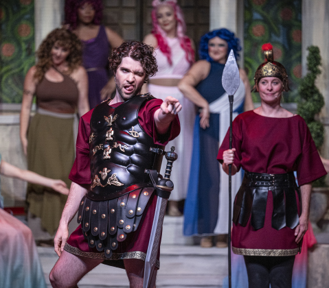 Ryan Rhue, as Miles Gloriosus, is  pictured in a Thursday, March 20, 2025 dress rehearsal of “A Funny Thing Happened On the Way to the Forum,” playing on the Palace main stage through April 19th.    Photo by Andy Sharp.