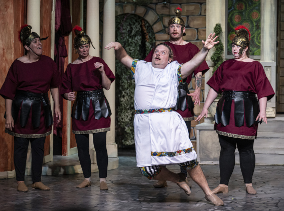 Nathan Clemenson, front, as Prologus, is joined by cast in roles as Protean members, including (left to right) Nick Riley, Meredith Brand, Matthew Hubble and Brooke McGaughey in a Thursday, March 20, 2025 dress rehearsal of “A Funny Thing Happened On the Way to the Forum,” playing on the Palace main stage through April 19th.    Photo by Andy Sharp.