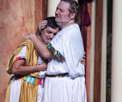 AJ Reyes, left, as Hysterium, and Nathan Clemenson, playing Prologus,  are pictured in a Thursday, March 20, 2025 dress rehearsal of “A Funny Thing Happened On the Way to the Forum,” playing on the Palace main stage through April 19th.    Photo by Andy Sharp.