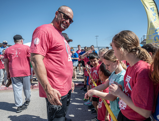 Georgetown Police Chief Cory Tchida  visits with race participants before the start of the one-mile Fun Run during the 13th Annual Chase the Chief, held Sunday, March 2, 2025 at East View High School.   2,000 people were registered for the one-mile fun run and 5K event.   Proceeds from the races support physical education programs in Georgetown.   Photo by Andy Sharp.