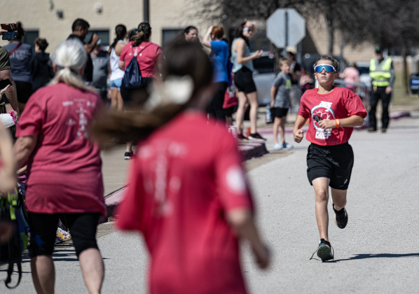 11-year-old Levi Thompson, a 5th grader at Ford Elementary School, was the first-place finisher in the one-mile Fun Run during the 13th Annual Chase the Chief, held Sunday, March 2, 2025 at East View High School.   2,000 people were registered for the one-mile fun run and 5K event.   Proceeds from the races support physical education programs in Georgetown.   Photo by Andy Sharp.