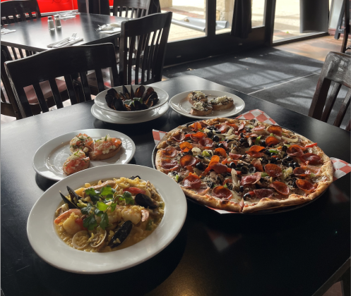 Black Mussels Umido, Bruschetta Originale and Brus- chetta con Funghi, Suprema Pizza and Italian Paella.