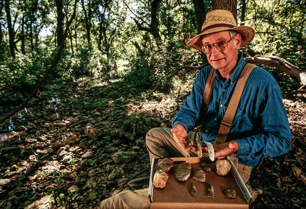 Archaeologist Mike Collins presents Clovis artifacts at the Gault Archaeological site in Florence. More than 2.6 million historical items were found on the property. Photo courtesy of "The Stones are Speaking"
