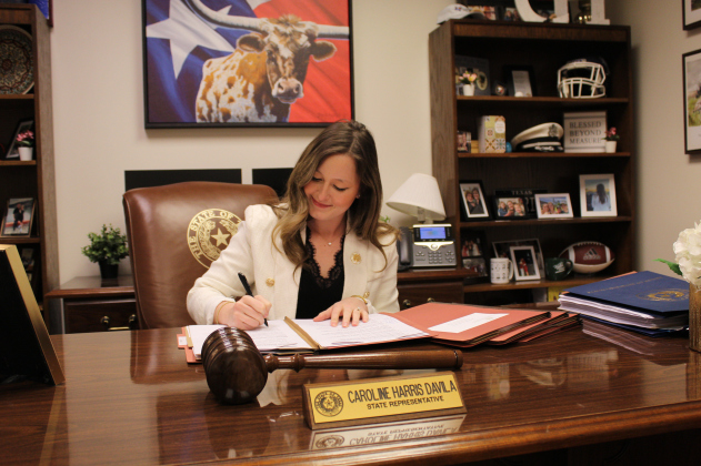 State Representative Caroline Harris Davila, R-Round Rock, works on House Bill 517, which deals with HOA fines, in her office at the Texas Capitol in downtown Austin, April 3. Photo by Nalani Nuylan.