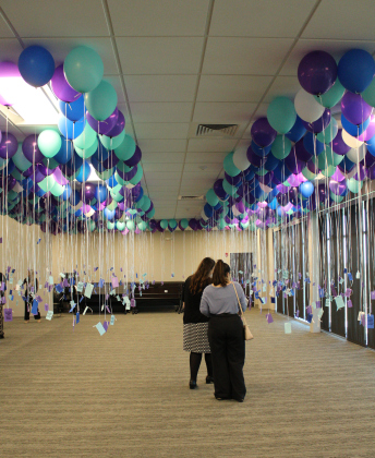 The County Attorney’s Office, who hosts the event, added the balloons to this year’s ceremony. Each balloon represents a certain number of people affected by crime. Photo by Nalani Nuylan.