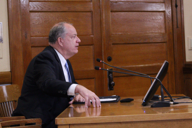 Senior Director of Infrastructure Bob Dale explains the resolution to ask the Central Texas Regional Mobile Authority to conduct a study on Ronald Reagan Boulevard in Williamson County during the April 15 commissioners court meeting. Photo by Nalani Nuylan.