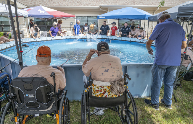 Tommy Sherek, 73, left, and Larry Newell, 85, right, concentrate on catching fish during the 22nd Annual Fishing Tournament held at Taylor’s SPJST Senior Living  on Thursday, April 24.