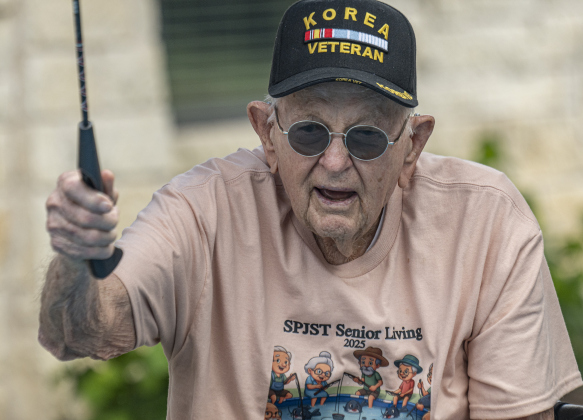 97-year-old Calvin Ging  casts his line  during the 22nd Annual Fishing Tournament held at Taylor’s SPJST Senior Living  on Thursday, April 24.