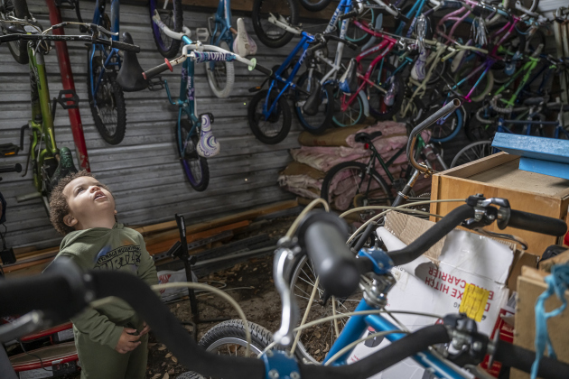 2-year-old Myles Durant was impressed by all the bicycles and accessories available as he spent time with his family at Georgetown Free Bikes.