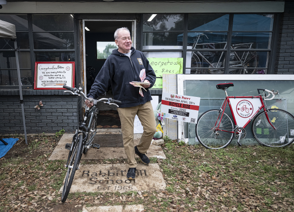 Steve Gallacher smiles as he leaves with a bicycle he got for his son-in-law at Georgetown Free Bikes.
