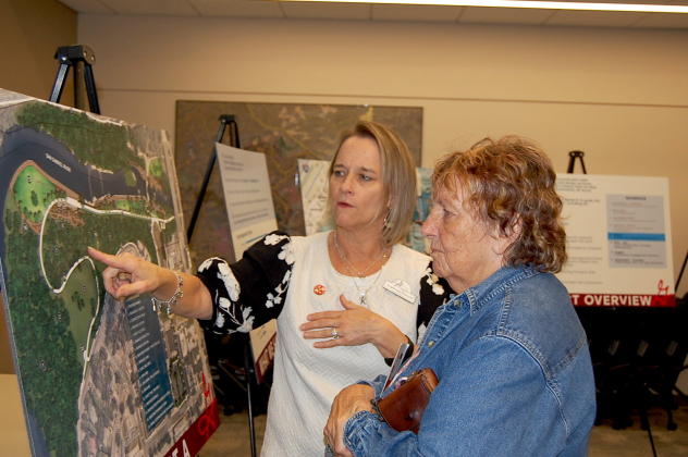 Kimberly Garrett, Parks and Recreation Director, left, talks with resident Joyce Radloff about the Blue Hole Park Master Plan and potential changes coming to the park. (Photos by Kaitlyn Wilkes)