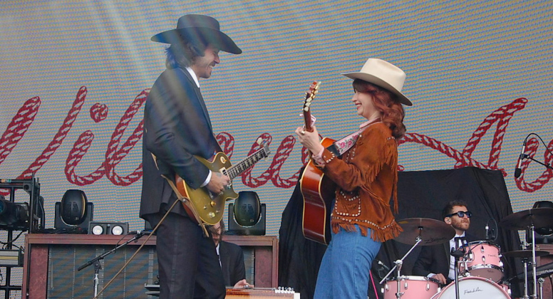 Willow Avalon, right, and her guitarist have fun on stage during an afternoon set on Sunday, April 6.
