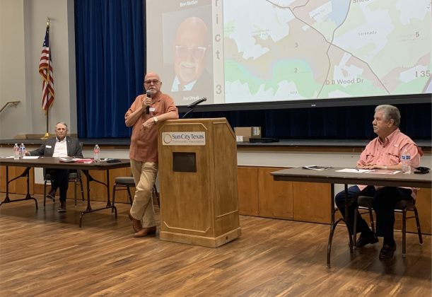 Joe Orsak, center, answers an audience question during the city council candidate forum on April 16. Mr. Orsak and Ben Butler, left, are running for District 3 and Ron Garland, right, is the incumbent for District 4. (Photo by Kaitlyn Wilkes)