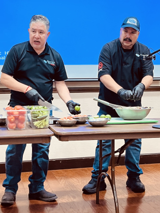 Carlos Manzano and Santos Garcia prepare Pico de Gallo.