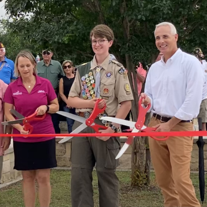 From left, Kimberly Garrett of Georgetown Parks and Recreation who manages the cemetery, Trevor Suggs, the Scout, and Mayor Josh Schroeder.